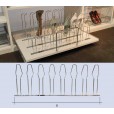 Geleiders voor een uittrekbaar plateau t.b.v. schoenen en/of laarzenhouders